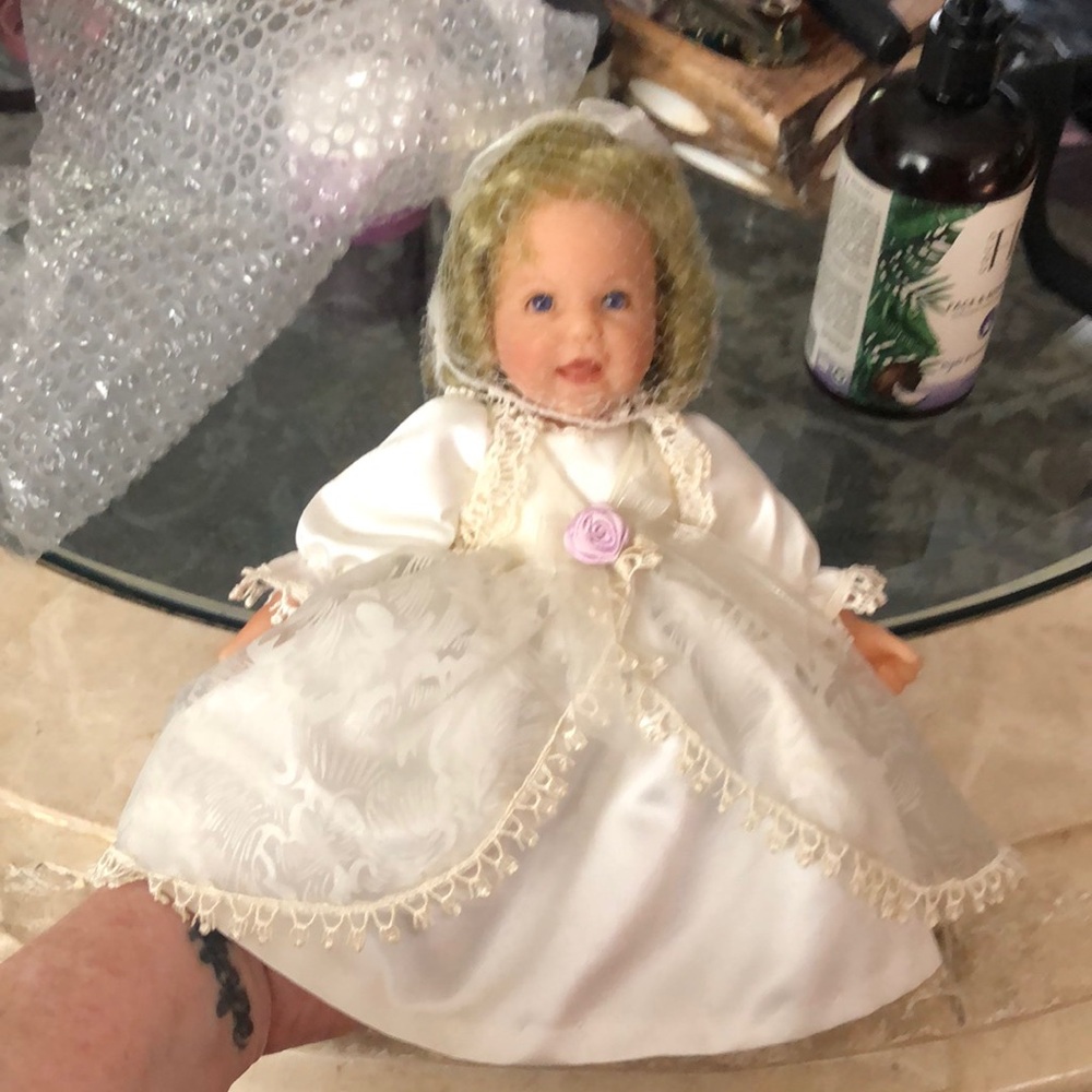 Elegant White Doll with Blonde Hair